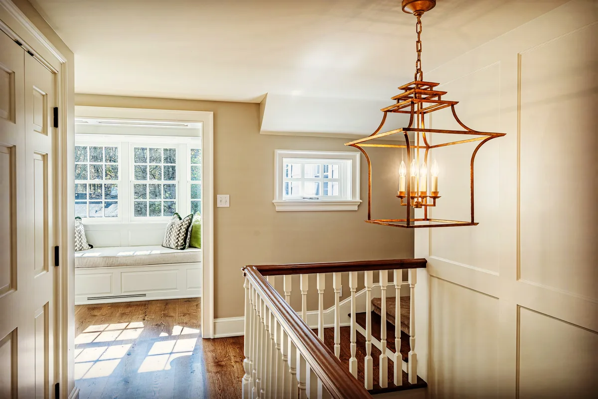 Interior hallway with painted wainscoting and warm neutral walls, Malvern, PA